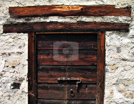 To use this stock image in your creative project, please select the size you need over to the right and click the "Add to Cart" button.
Your downloaded image will come with the Cutcaster watermark removed so don’t worry about the watermark you see on this page. Alpine refuge wooden door stock photo, Old door of a baita (Alpine refuge) in Ossola Valley, Piedmont, Italy by Roberto Marinello