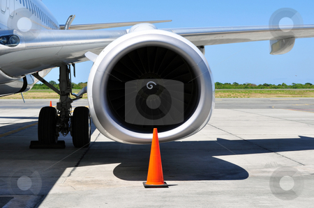 To use this stock image in your creative project, please select the size you need over to the right and click the "Add to Cart" button.
Your downloaded image will come with the Cutcaster watermark removed so don’t worry about the watermark you see on this page. Air transportation: Jet engine detail stock photo, Commercial airliner: wing and engine detail. by Fernando Barozza
