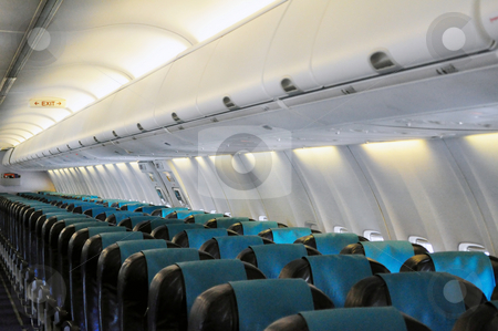To use this stock image in your creative project, please select the size you need over to the right and click the "Add to Cart" button.
Your downloaded image will come with the Cutcaster watermark removed so don’t worry about the watermark you see on this page. Airliner passenger cabin stock photo, Empty passengers' cabin in commercial jet airplane by Fernando Barozza