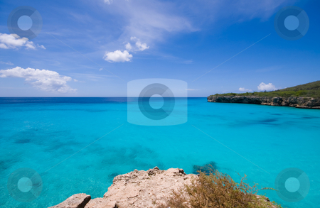 To use this stock image in your creative project, please select the size you need over to the right and click the "Add to Cart" button.
Your downloaded image will come with the Cutcaster watermark removed so don’t worry about the watermark you see on this page. Turquoise water viewpoint stock photo, Turquoise caribbean bay view with a nice deserted beach by Karin Claus