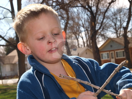 To use this stock image in your creative project, please select the size you need over to the right and click the "Add to Cart" button.
Your downloaded image will come with the Cutcaster watermark removed so don’t worry about the watermark you see on this page. Young Boy Playing stock photo, Color image of a young boy playing. by Michael Rice