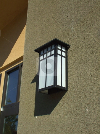 To use this stock image in your creative project, please select the size you need over to the right and click the "Add to Cart" button.
Your downloaded image will come with the Cutcaster watermark removed so don’t worry about the watermark you see on this page. Outdoor Light Fixture stock photo, by Michael Felix