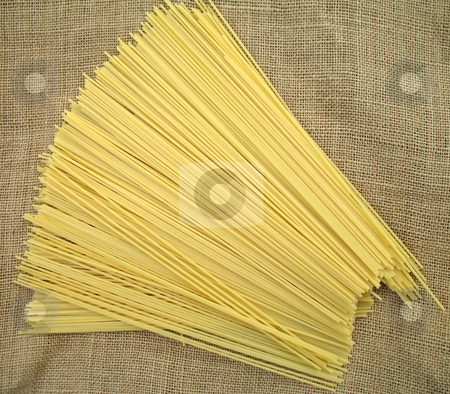 To use this stock image in your creative project, please select the size you need over to the right and click the "Add to Cart" button.
Your downloaded image will come with the Cutcaster watermark removed so don’t worry about the watermark you see on this page. Spaghetti stock photo, Spaghetti pasta ready to be cooked by Roberto Marinello