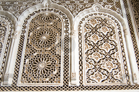 To use this stock image in your creative project, please select the size you need over to the right and click the "Add to Cart" button.
Your downloaded image will come with the Cutcaster watermark removed so don’t worry about the watermark you see on this page. Bahia Palace Marrakesh stucco stock photo, Stucco details of Bahia Palace in Marrakesh by Roberto Marinello