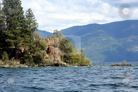 To use this stock image in your creative project, please select the size you need over to the right and click the "Add to Cart" button.
Your downloaded image will come with the Cutcaster watermark removed so don’t worry about the watermark you see on this page. Flat head Lake Montana stock photo, Flathead Lake in Montana by Larry Stolle