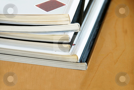 To use this stock image in your creative project, please select the size you need over to the right and click the "Add to Cart" button.
Your downloaded image will come with the Cutcaster watermark removed so don’t worry about the watermark you see on this page. Magazines pile stock photo, Black and white magazines pile closeup on wooden desk by Julija Sapic