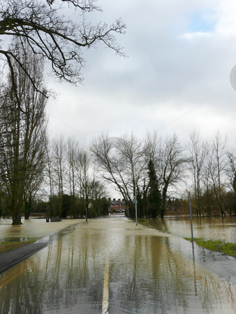 To use this stock image in your creative project, please select the size you need over to the right and click the "Add to Cart" button.
Your downloaded image will come with the Cutcaster watermark removed so don’t worry about the watermark you see on this page. Flooded Road stock photo, Witham, Essex, UK - 10 Feb A small river has burst its' banks and flooded the riverside footpath and nearby roads. Unusual for Essex as we are the driest UK county. by Helen Shorey