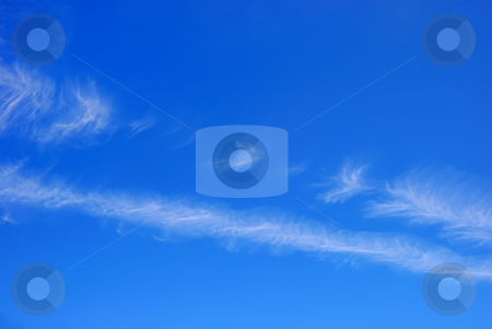To use this stock image in your creative project, please select the size you need over to the right and click the "Add to Cart" button.
Your downloaded image will come with the Cutcaster watermark removed so don’t worry about the watermark you see on this page. Blue Sky with White Clouds stock photo, Blue sky with two diagonal white cloud stripes. by Denis Radovanovic