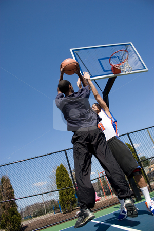 To use this stock image in your creative project, please select the size you need over to the right and click the "Add to Cart" button.
Your downloaded image will come with the Cutcaster watermark removed so don’t worry about the watermark you see on this page. Man Playing Basketball stock photo, A young basketball player going for a jump shot. by Todd Arena