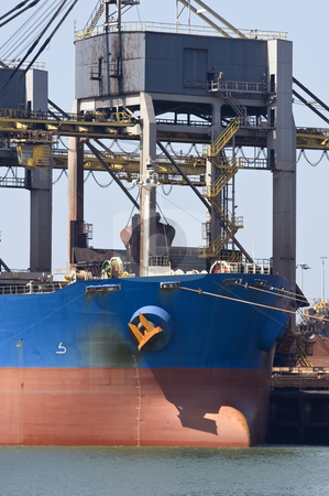 To use this stock image in your creative project, please select the size you need over to the right and click the "Add to Cart" button.
Your downloaded image will come with the Cutcaster watermark removed so don’t worry about the watermark you see on this page. Unloading iron ore stock photo, A huge crane unloading ore from a bulk carrier by Corepics VOF