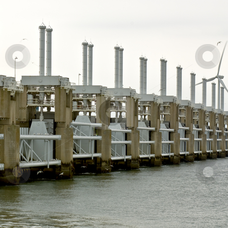 To use this stock image in your creative project, please select the size you need over to the right and click the "Add to Cart" button.
Your downloaded image will come with the Cutcaster watermark removed so don’t worry about the watermark you see on this page. Seagulls around the Oosterschelde Storm Barrier stock photo, Seagulls surrounding the high tech water management and protection structure of the Oosterschelde Storm flood barrier by Corepics VOF