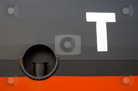 To use this stock image in your creative project, please select the size you need over to the right and click the "Add to Cart" button.
Your downloaded image will come with the Cutcaster watermark removed so don’t worry about the watermark you see on this page. T for Tug stock photo, A huge T on the hull of a container ship next to a mooring post, used for tugs to attach their ropes to by Corepics VOF