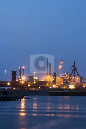 To use this stock image in your creative project, please select the size you need over to the right and click the "Add to Cart" button.
Your downloaded image will come with the Cutcaster watermark removed so don’t worry about the watermark you see on this page. Industrial activityy at night stock photo, A crane moving in a steel plant at night by Corepics VOF