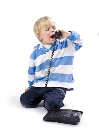 To use this stock image in your creative project, please select the size you need over to the right and click the "Add to Cart" button.
Your downloaded image will come with the Cutcaster watermark removed so don’t worry about the watermark you see on this page. Small boy on the phone stock photo, A small boy, 3 years old, talking on the phone by Corepics VOF
