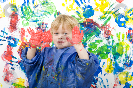To use this stock image in your creative project, please select the size you need over to the right and click the "Add to Cart" button.
Your downloaded image will come with the Cutcaster watermark removed so don’t worry about the watermark you see on this page. Hands with paint stock photo, Boy showing his hands covered with red finger paint in front of his work of art by Corepics VOF