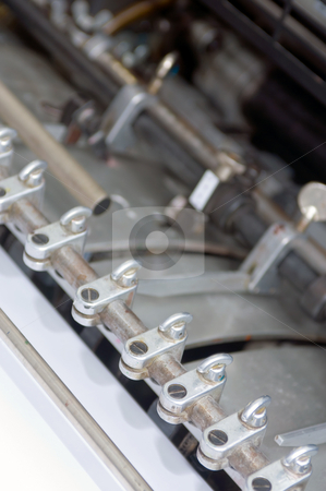 To use this stock image in your creative project, please select the size you need over to the right and click the "Add to Cart" button.
Your downloaded image will come with the Cutcaster watermark removed so don’t worry about the watermark you see on this page. Sheet feeder stock photo, The sheetfeeder of an offset printing press by Corepics VOF