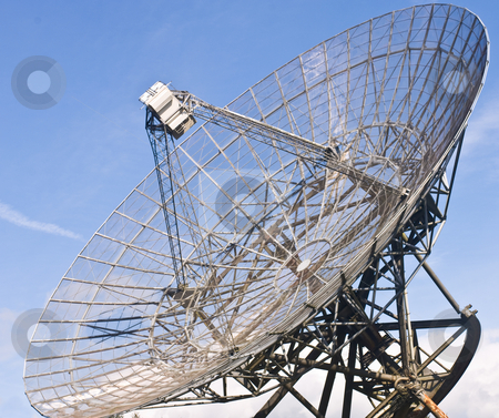 To use this stock image in your creative project, please select the size you need over to the right and click the "Add to Cart" button.
Your downloaded image will come with the Cutcaster watermark removed so don’t worry about the watermark you see on this page. Radio Telescope Dish stock photo, A close-up of the immense satellite dish of a Radio Telescope by Corepics VOF