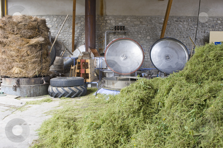 To use this stock image in your creative project, please select the size you need over to the right and click the "Add to Cart" button.
Your downloaded image will come with the Cutcaster watermark removed so don’t worry about the watermark you see on this page. Herbal essences distillery stock photo, The herbal essences distillery, with a heap of thyme in the foreground, the pressure cookers, used to distill the essences, with their open lids and a bale of lavender on the right by Corepics VOF