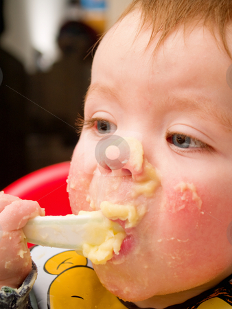 To use this stock image in your creative project, please select the size you need over to the right and click the "Add to Cart" button.
Your downloaded image will come with the Cutcaster watermark removed so don’t worry about the watermark you see on this page. Messy baby Boy eating mashed potato stock photo, Messy baby Boy eating mashed potato with spoon by Phillip Dyhr Hobbs