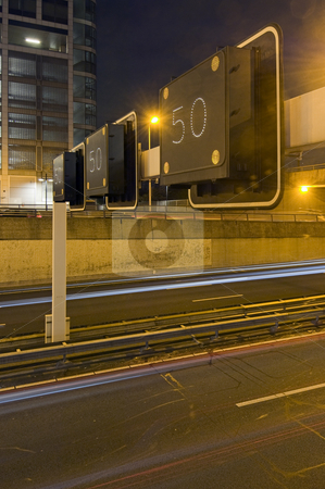 To use this stock image in your creative project, please select the size you need over to the right and click the "Add to Cart" button.
Your downloaded image will come with the Cutcaster watermark removed so don’t worry about the watermark you see on this page. Motorway Information System stock photo, An overhead motorway information system warning drivers of a traffic jam ahead, setting the speed limit to 50 kilometers per hour by Corepics VOF