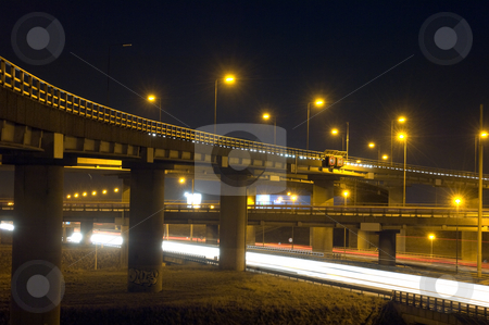 To use this stock image in your creative project, please select the size you need over to the right and click the "Add to Cart" button.
Your downloaded image will come with the Cutcaster watermark removed so don’t worry about the watermark you see on this page. Motorway Over-pass stock photo, The viaducts of a motorway junction at night by Corepics VOF