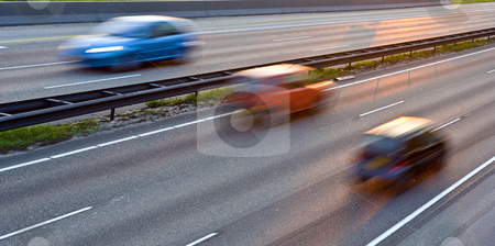To use this stock image in your creative project, please select the size you need over to the right and click the "Add to Cart" button.
Your downloaded image will come with the Cutcaster watermark removed so don’t worry about the watermark you see on this page. Heading Home stock photo, A multiple lane highway, with three cars in motion blur, driving in the evening light. by Corepics VOF