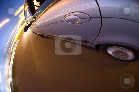 To use this stock image in your creative project, please select the size you need over to the right and click the "Add to Cart" button.
Your downloaded image will come with the Cutcaster watermark removed so don’t worry about the watermark you see on this page. Around the bend stock photo, A car turning right at twilight on a busy street by Corepics VOF