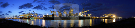 To use this stock image in your creative project, please select the size you need over to the right and click the "Add to Cart" button.
Your downloaded image will come with the Cutcaster watermark removed so don’t worry about the watermark you see on this page. Container harbor during twilight stock photo, Three container vessels moored off at the docks of a container terminal by Corepics VOF