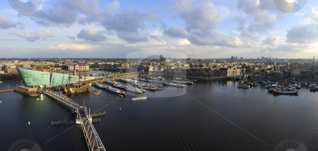 To use this stock image in your creative project, please select the size you need over to the right and click the "Add to Cart" button.
Your downloaded image will come with the Cutcaster watermark removed so don’t worry about the watermark you see on this page. Amsterdam Skyline stock photo, The skyline of Amsterdam during a typical dutch spring afternoon by Corepics VOF