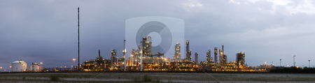 To use this stock image in your creative project, please select the size you need over to the right and click the "Add to Cart" button.
Your downloaded image will come with the Cutcaster watermark removed so don’t worry about the watermark you see on this page. Petrochemical industry at dawn stock photo, A 22 stitched image panoramic of a petrochemical plant at a grey, gloomy dawn by Corepics VOF