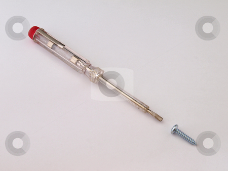 To use this stock image in your creative project, please select the size you need over to the right and click the "Add to Cart" button.
Your downloaded image will come with the Cutcaster watermark removed so don’t worry about the watermark you see on this page. Electrical screw driver. stock photo, Electrical screw driver with a chrome screw. by Ian Langley
