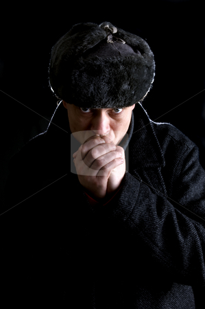 To use this stock image in your creative project, please select the size you need over to the right and click the "Add to Cart" button.
Your downloaded image will come with the Cutcaster watermark removed so don’t worry about the watermark you see on this page. Russian stock photo, A man, dressed as a Russian, warming his hands by Corepics VOF