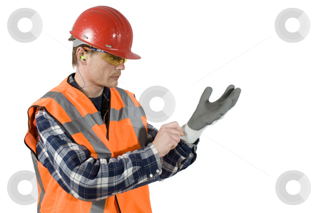 To use this stock image in your creative project, please select the size you need over to the right and click the "Add to Cart" button.
Your downloaded image will come with the Cutcaster watermark removed so don’t worry about the watermark you see on this page. Putting on gloves stock photo, A worker, with a hard top, ear plugs and goggels putting on gloves for safety. Clipping Path included by Corepics VOF