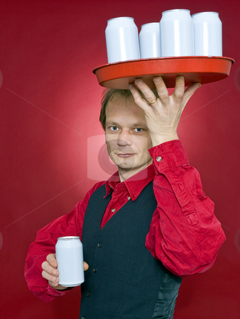 To use this stock image in your creative project, please select the size you need over to the right and click the "Add to Cart" button.
Your downloaded image will come with the Cutcaster watermark removed so don’t worry about the watermark you see on this page. Serving you stock photo, A waiter with a tray of beverage cans above his head holding out one can in his outstetched hand to a customer by Corepics VOF