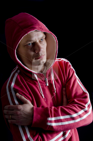 To use this stock image in your creative project, please select the size you need over to the right and click the "Add to Cart" button.
Your downloaded image will come with the Cutcaster watermark removed so don’t worry about the watermark you see on this page. Hoodlum stock photo, A hooded figure trying to look cool. by Corepics VOF