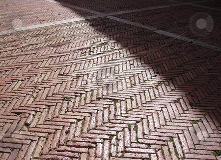To use this stock image in your creative project, please select the size you need over to the right and click the "Add to Cart" button.
Your downloaded image will come with the Cutcaster watermark removed so don’t worry about the watermark you see on this page. Sunlit walkway stock photo, Sunlit brick walkway with white stripes by Jaime Pharr
