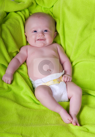 To use this stock image in your creative project, please select the size you need over to the right and click the "Add to Cart" button.
Your downloaded image will come with the Cutcaster watermark removed so don’t worry about the watermark you see on this page. Baby smile stock photo, A smiling newborn baby on a green towel. by Steve Mcsweeny