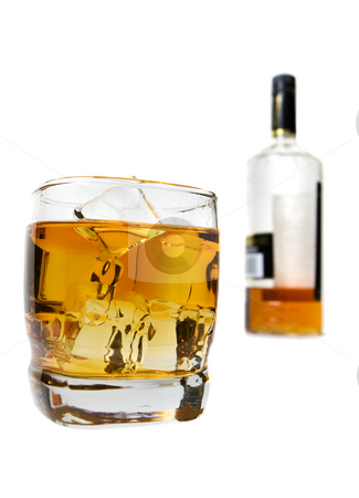 To use this stock image in your creative project, please select the size you need over to the right and click the "Add to Cart" button.
Your downloaded image will come with the Cutcaster watermark removed so don’t worry about the watermark you see on this page. On the rocks stock photo, A glass of whiskey with bottle burred out in the background by Steve Mcsweeny