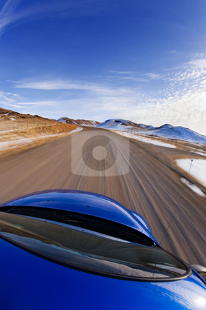 To use this stock image in your creative project, please select the size you need over to the right and click the "Add to Cart" button.
Your downloaded image will come with the Cutcaster watermark removed so don’t worry about the watermark you see on this page. City escape stock photo, Driving the rural foothills, fisheye lens distortion on car by Steve Mcsweeny