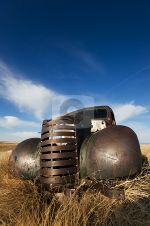 To use this stock image in your creative project, please select the size you need over to the right and click the "Add to Cart" button.
Your downloaded image will come with the Cutcaster watermark removed so don’t worry about the watermark you see on this page. Vintage truck stock photo, Vintage truck abandoned and rusting away in the prairies by Steve Mcsweeny
