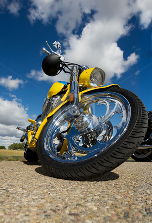 To use this stock image in your creative project, please select the size you need over to the right and click the "Add to Cart" button.
Your downloaded image will come with the Cutcaster watermark removed so don’t worry about the watermark you see on this page. Yellow chopper stock photo, A yellow custom made motorcycle parked by Steve Mcsweeny