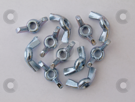 To use this stock image in your creative project, please select the size you need over to the right and click the "Add to Cart" button.
Your downloaded image will come with the Cutcaster watermark removed so don’t worry about the watermark you see on this page. 6mm wing nuts stock photo, 6mm wing nuts use in assembly for easy release. by Ian Langley