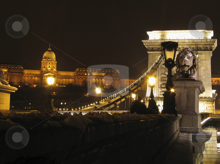 To use this stock image in your creative project, please select the size you need over to the right and click the "Add to Cart" button.
Your downloaded image will come with the Cutcaster watermark removed so don’t worry about the watermark you see on this page. Budapest Chain Bridge and royal palace stock photo, Budapest Chain Bridge and royal palace at night by Alessandro Rizzolli