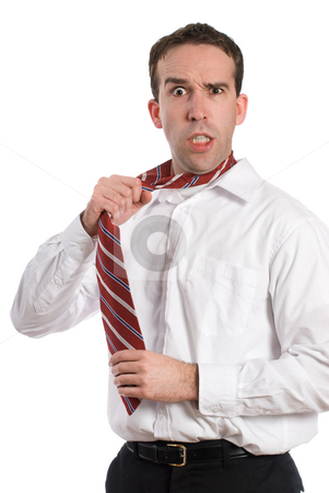 To use this stock image in your creative project, please select the size you need over to the right and click the "Add to Cart" button.
Your downloaded image will come with the Cutcaster watermark removed so don’t worry about the watermark you see on this page. Stressed Businessman stock photo, A stressed businessman is pulling on his tie and getting mad, isolated against a white background by Richard Nelson