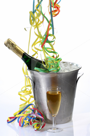 To use this stock image in your creative project, please select the size you need over to the right and click the "Add to Cart" button.
Your downloaded image will come with the Cutcaster watermark removed so don’t worry about the watermark you see on this page. Partytime stock photo, Champaigne bottle in a cooler with ice on bright background by Birgit Reitz-Hofmann