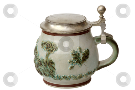 To use this stock image in your creative project, please select the size you need over to the right and click the "Add to Cart" button.
Your downloaded image will come with the Cutcaster watermark removed so don’t worry about the watermark you see on this page. German beer jug stock photo, A traditional German beer jug with silver lid isolated on white background by Birgit Reitz-Hofmann