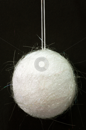 To use this stock image in your creative project, please select the size you need over to the right and click the "Add to Cart" button.
Your downloaded image will come with the Cutcaster watermark removed so don’t worry about the watermark you see on this page. Chrismas ball stock photo, Chrismas ball hanging on black background by Birgit Reitz-Hofmann