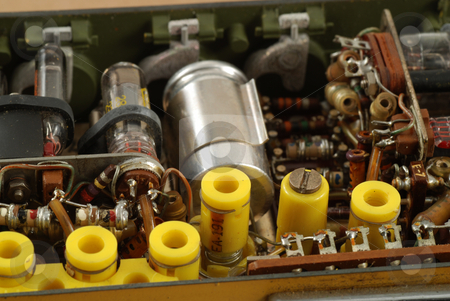 To use this stock image in your creative project, please select the size you need over to the right and click the "Add to Cart" button.
Your downloaded image will come with the Cutcaster watermark removed so don’t worry about the watermark you see on this page. Vintage electronics stock photo, Interior of a vintage radio transmitter showing the different old and bulky components used by Albert Lozano