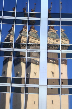 To use this stock image in your creative project, please select the size you need over to the right and click the "Add to Cart" button.
Your downloaded image will come with the Cutcaster watermark removed so don’t worry about the watermark you see on this page. City monument reflection stock photo, Monument circle statue reflecting off of a tower in downtown Indianapolis Indiana by Chris Torres