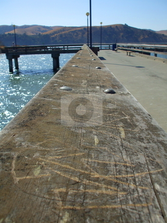 To use this stock image in your creative project, please select the size you need over to the right and click the "Add to Cart" button.
Your downloaded image will come with the Cutcaster watermark removed so don’t worry about the watermark you see on this page. Small Pier stock photo, by Michael Felix